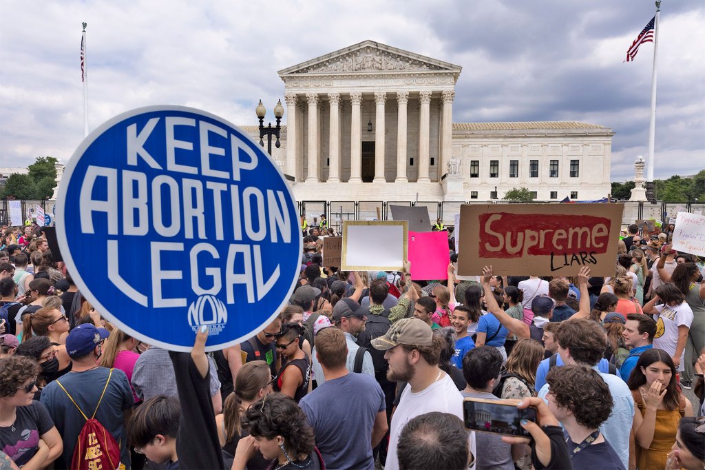 Abortion rights activists protest outside the Supreme Court in Washington, DC, USA, 24 June 2022.