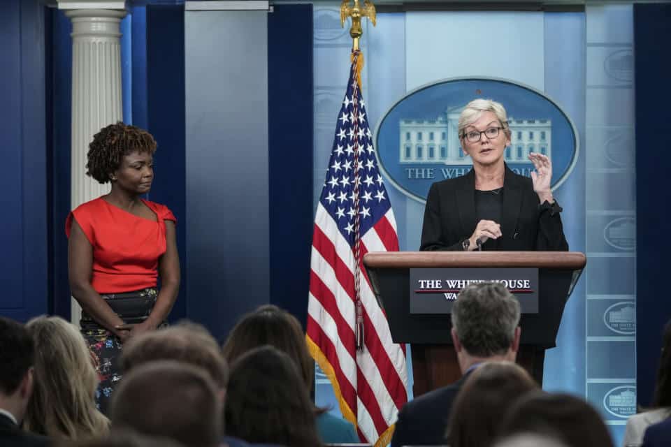 WASHINGTON, DC - JUNE 22: (L-R) White House Press Secretary Karine Jean-Pierre looks on as US Secretary of Energy Jennifer Granholm speaks during the daily press briefing at the White House on June 22, 2022 in Washington, DC.  Granholm discussed the administration's response to rising gas prices.  (Photo by Drew Angerer/Getty Images)